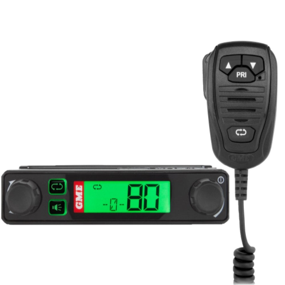 GME Super Compact Radio UHF CB 5 Watt-TX3120S. Front view of black radio with green LCD screen and black microphone.