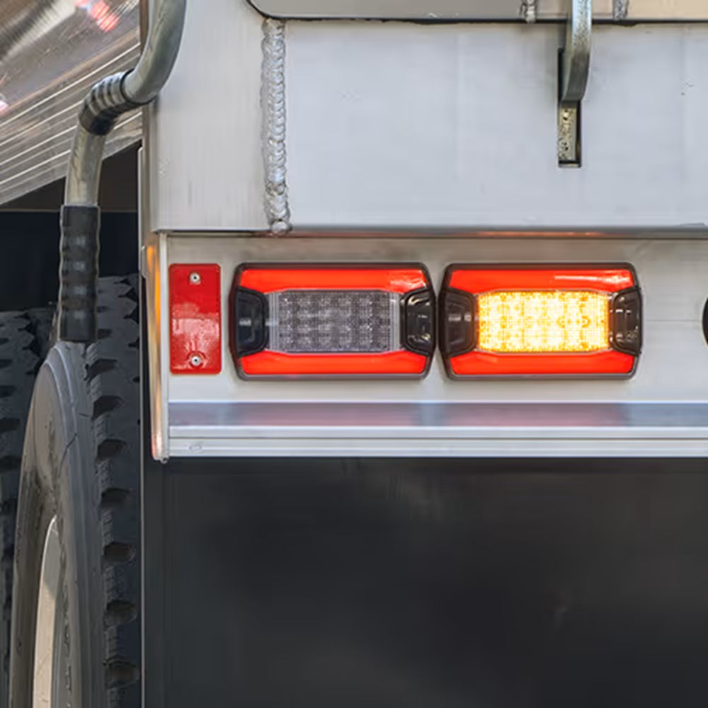 2BA 350 300-037 Hella DuraLED PRIME Rear Flashing Indicator Lamp-Close-up of red LED tail lights on a vehicle.