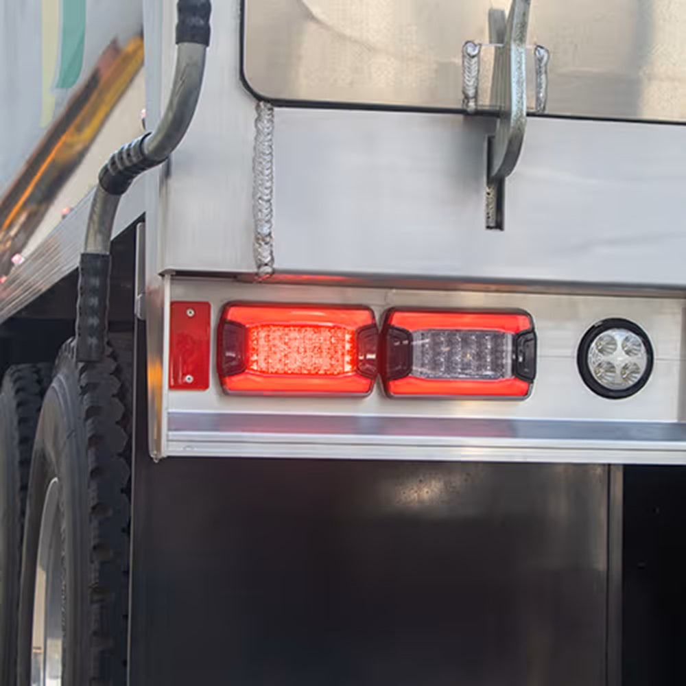 2SB 350 300-057 Hella DuralLED PRIME -Close-up of a vehicle's tail light assembly on a trailer.