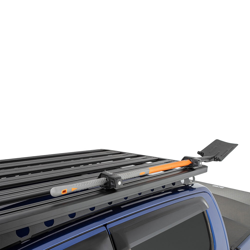 Rhino-Rack Stow It Utility Holder Kit-RSIT2. Front view of 2 x utility holders attached to a roof rack holding on a shovel.